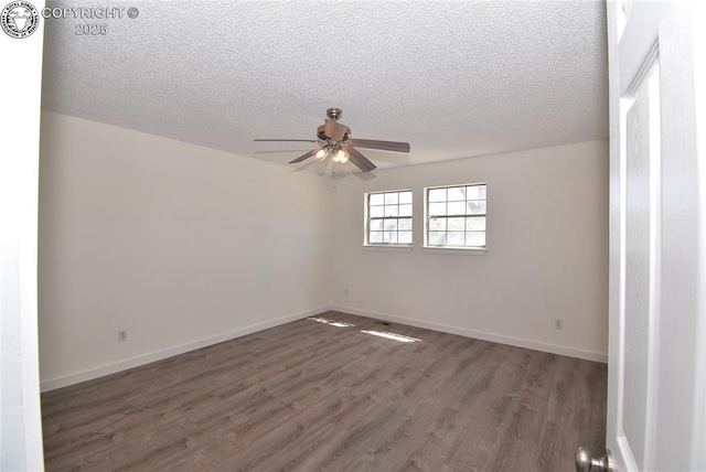 empty room featuring baseboards, a textured ceiling, ceiling fan, and wood finished floors