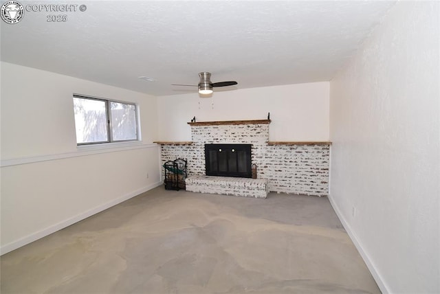 unfurnished living room with carpet floors, ceiling fan, baseboards, and a fireplace