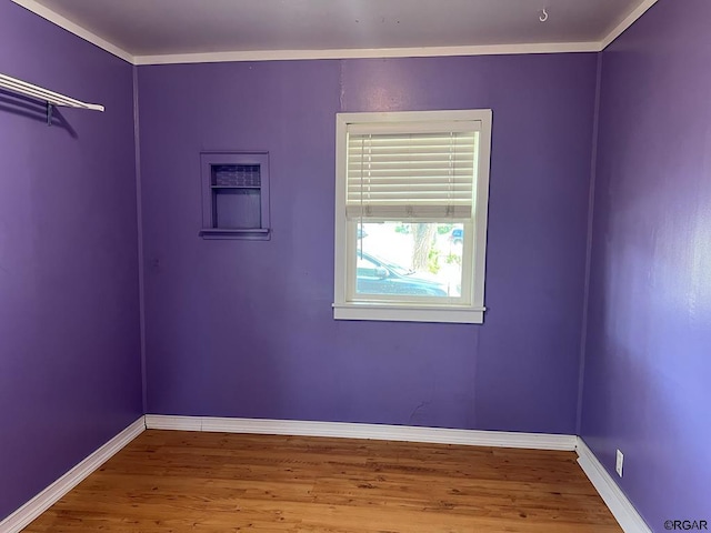 empty room featuring hardwood / wood-style flooring