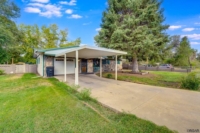 exterior space featuring a carport and a front yard