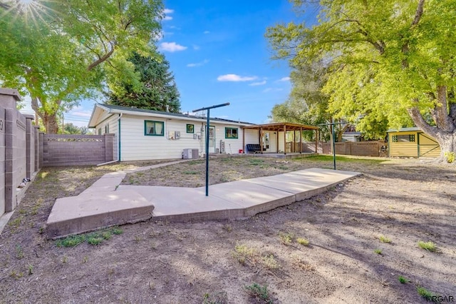 back of property featuring a patio