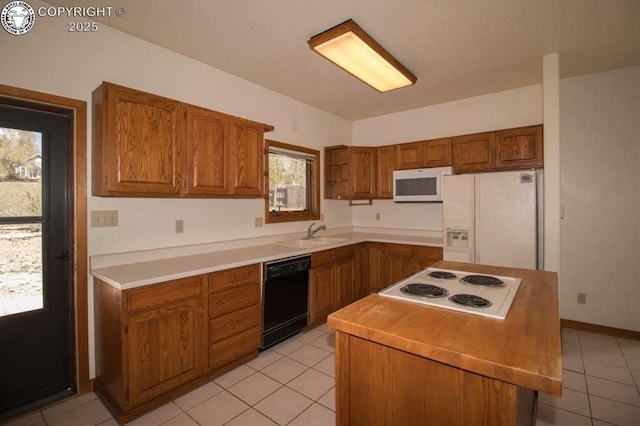 2324 W Willamette Ave, Colorado Springs, CO 80904 - kitchen with brown cabinetry, open shelves, a sink, white appliances, and light tile patterned flooring