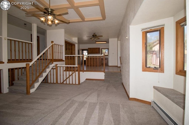 2324 W Willamette Ave, Colorado Springs, CO 80904 - interior space with ceiling fan, baseboard heating, carpet, baseboards, and coffered ceiling