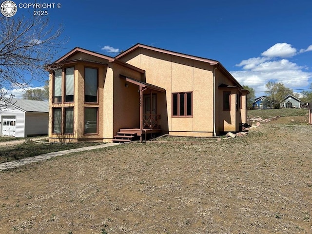 2324 W Willamette Ave, Colorado Springs, CO 80904 - view of front facade featuring stucco siding