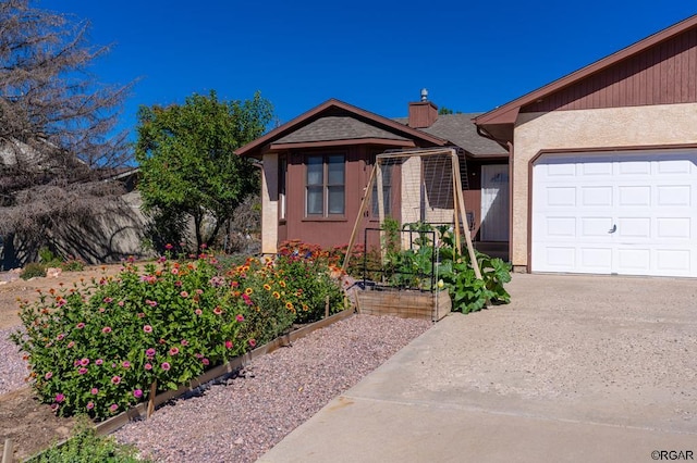 view of front of home with a garage