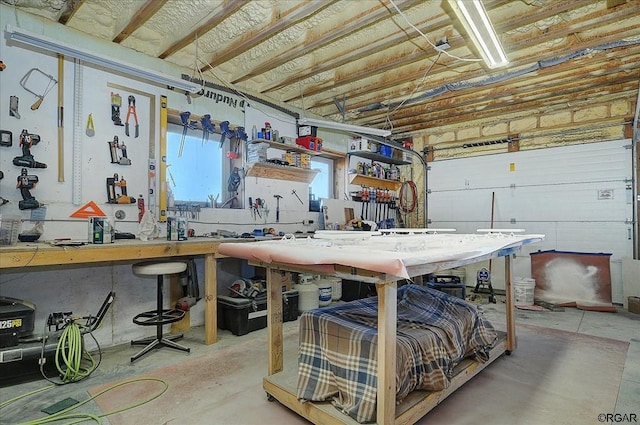 garage featuring a workshop area