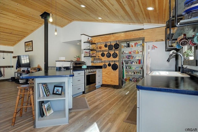 kitchen with lofted ceiling, wooden ceiling, sink, and stainless steel gas range