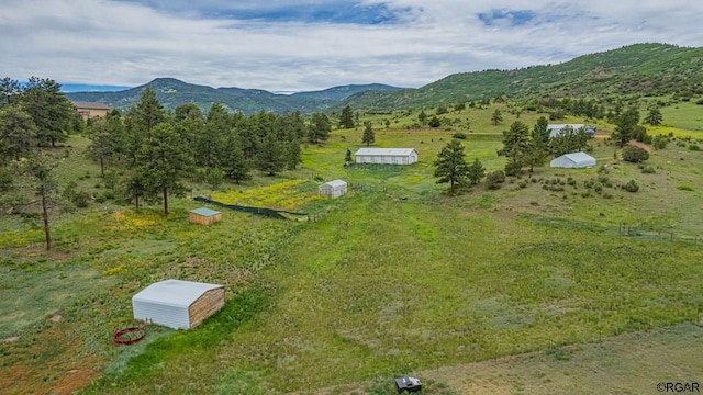 drone / aerial view featuring a mountain view