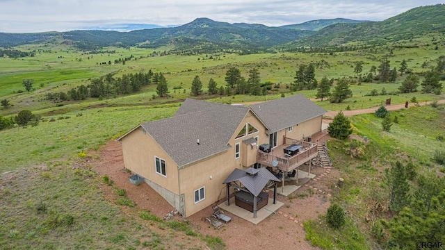 bird's eye view with a mountain view and a rural view