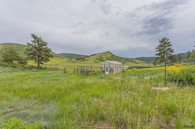 property view of mountains with a rural view