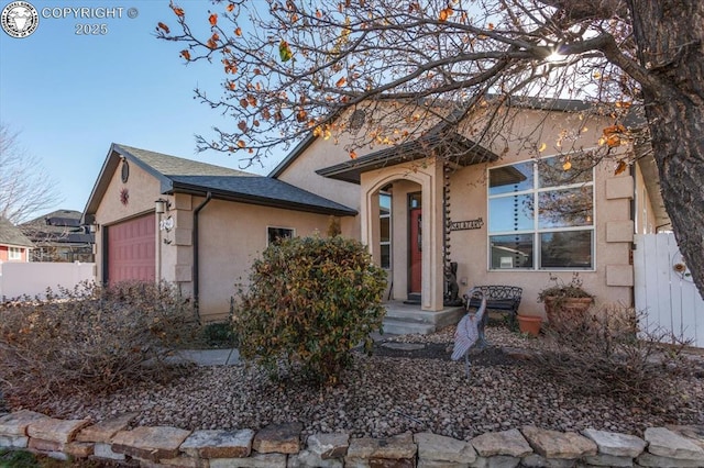 view of front of home with a garage