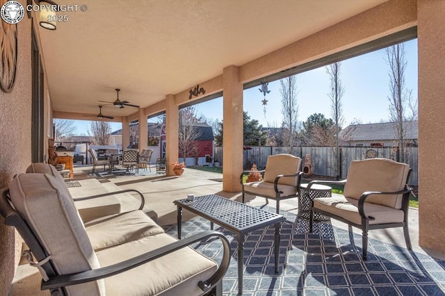 view of patio / terrace featuring ceiling fan and outdoor lounge area