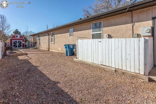 exterior space featuring a storage shed