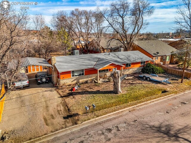 view of front of house featuring a carport