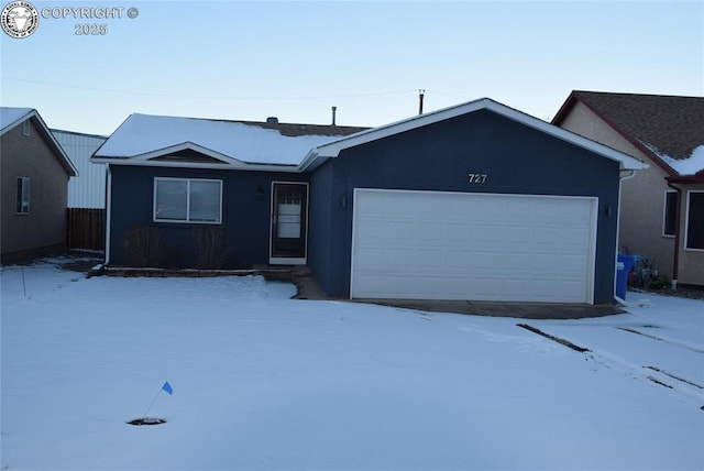 single story home with a garage