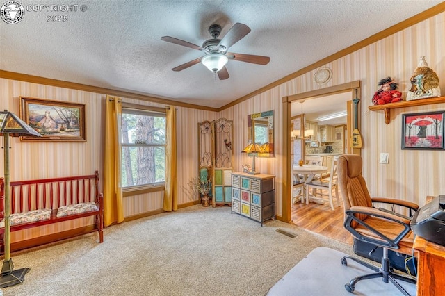 575 Wykagyl Rd, Westcliffe, CO 81252 - carpeted office space with crown molding, ceiling fan, a textured ceiling, visible vents, and wallpapered walls