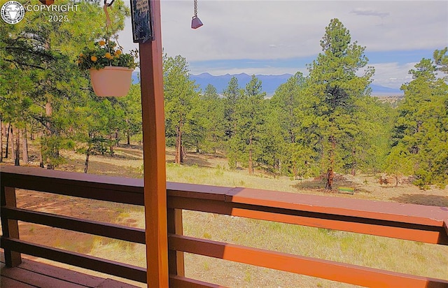 575 Wykagyl Rd, Westcliffe, CO 81252 - wooden deck with a mountain view