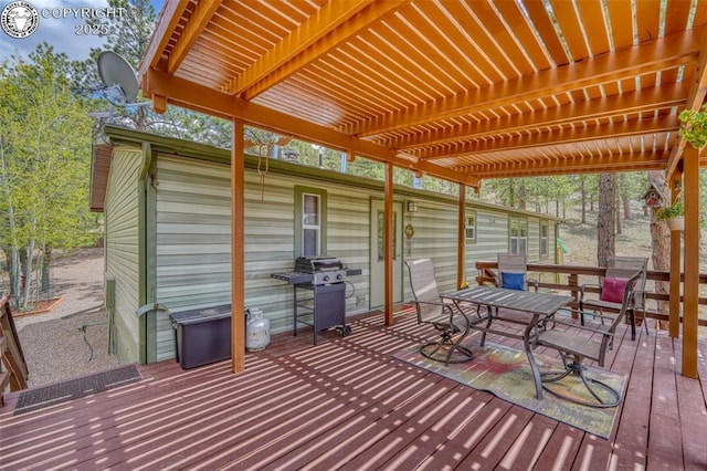 575 Wykagyl Rd, Westcliffe, CO 81252 - wooden terrace featuring a grill, outdoor dining space, and a pergola