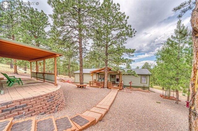 575 Wykagyl Rd, Westcliffe, CO 81252 - view of patio featuring a wooden deck