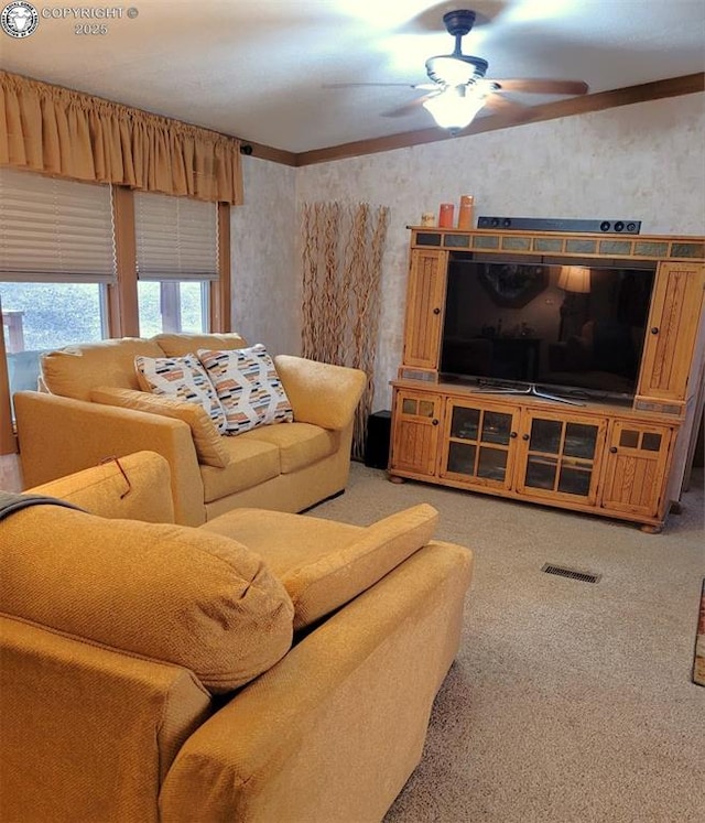 575 Wykagyl Rd, Westcliffe, CO 81252 - living room featuring visible vents, a ceiling fan, and light carpet