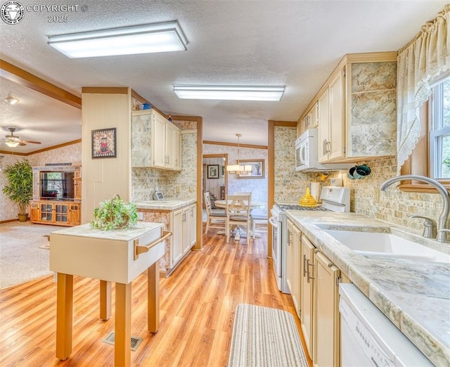 575 Wykagyl Rd, Westcliffe, CO 81252 - kitchen with light countertops, white appliances, a textured ceiling, and a sink