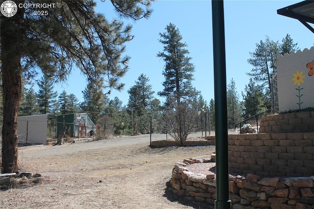 view of yard with fence