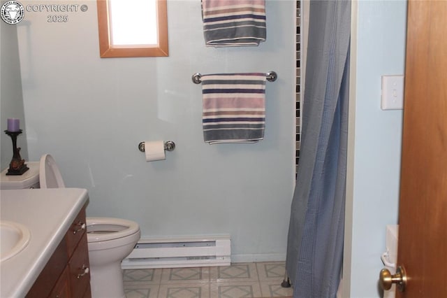 full bath with baseboards, toilet, tile patterned floors, baseboard heating, and vanity