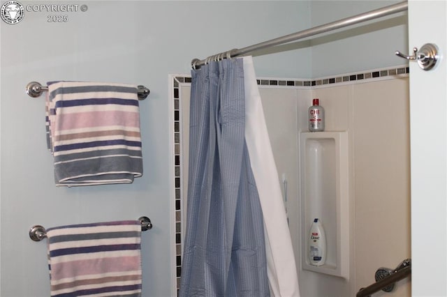 bathroom with curtained shower