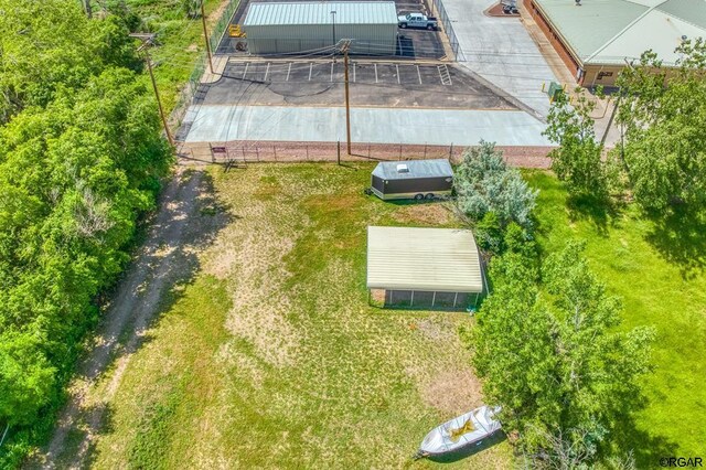 back of house featuring a yard and a patio