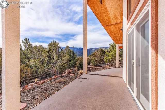 view of patio with a mountain view