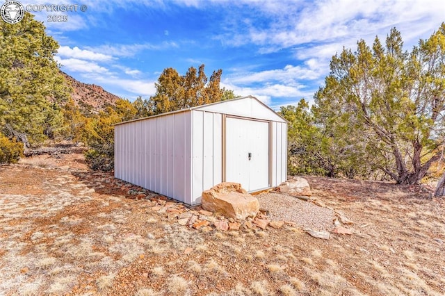 view of outdoor structure with a mountain view