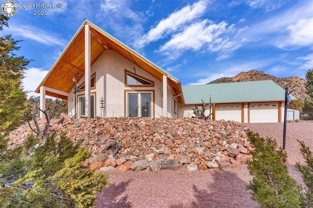 exterior space with a garage