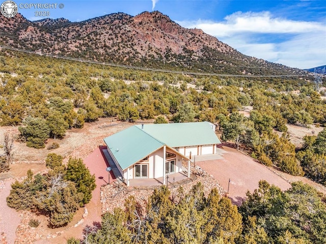 drone / aerial view featuring a mountain view