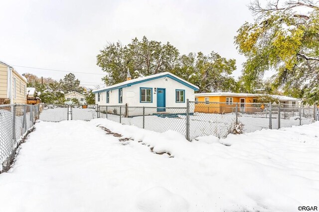 view of snow covered property