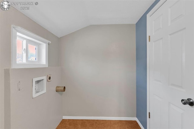 laundry area featuring washer hookup, hookup for an electric dryer, and light tile patterned floors