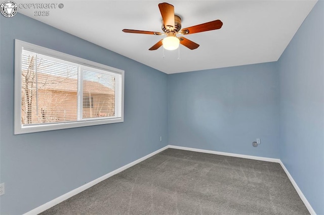 carpeted empty room with ceiling fan