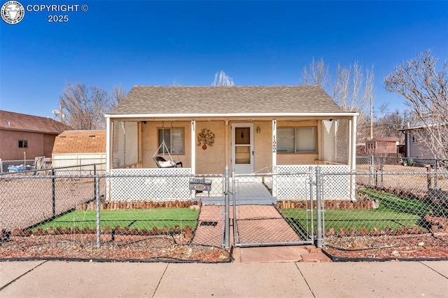 view of front of property with a porch and a front lawn