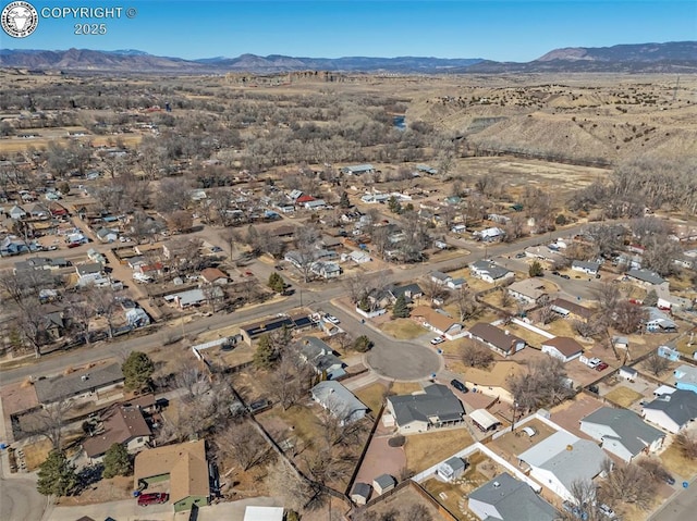 aerial view with a residential view and a mountain view