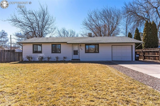 single story home with a front lawn, concrete driveway, fence, and an attached garage