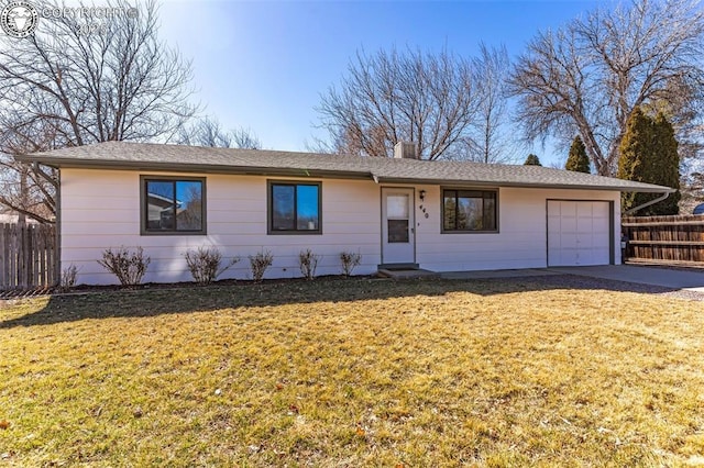 ranch-style house with a front lawn, fence, driveway, and an attached garage