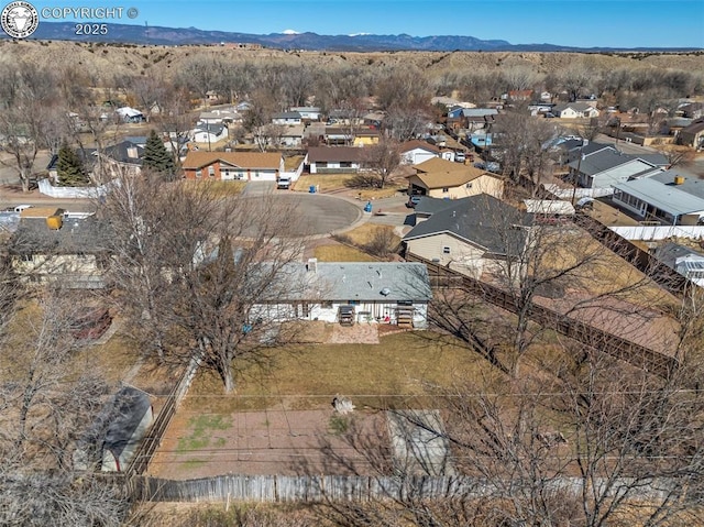 birds eye view of property featuring a residential view and a mountain view