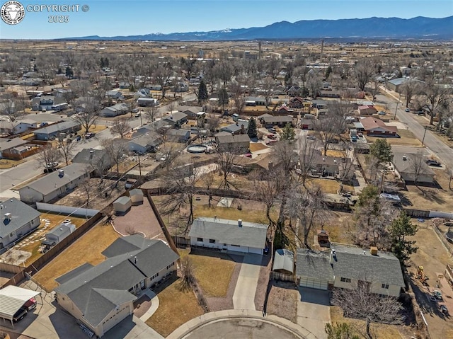 aerial view with a residential view and a mountain view