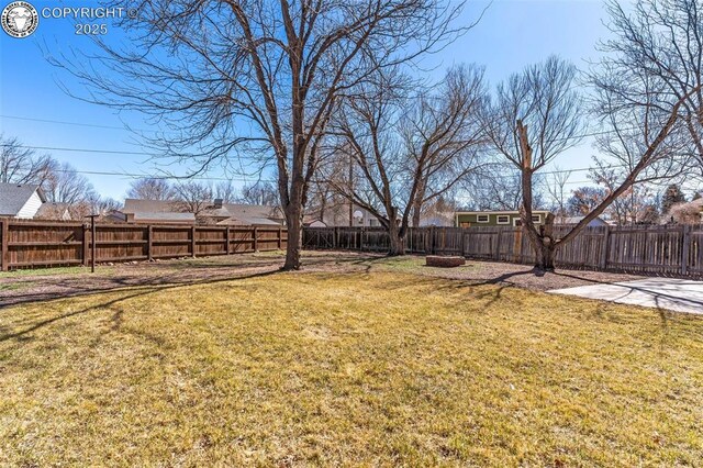 view of yard featuring a fenced backyard