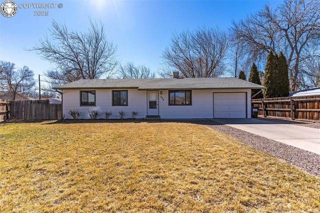 ranch-style home with a front yard, concrete driveway, fence, and an attached garage