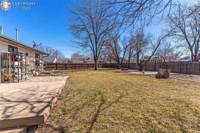 view of yard featuring a patio and a fenced backyard