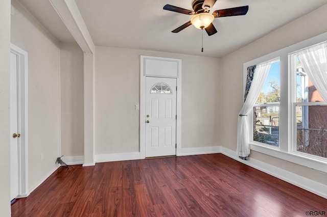 entrance foyer with dark wood-type flooring and ceiling fan