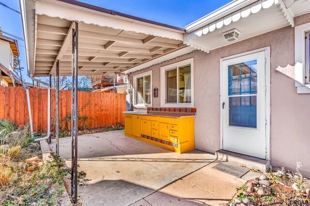 view of patio / terrace featuring exterior bar