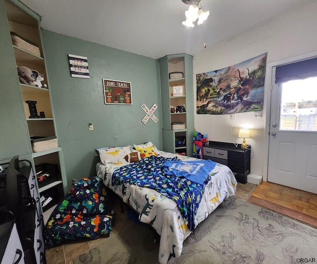 bedroom featuring light parquet floors