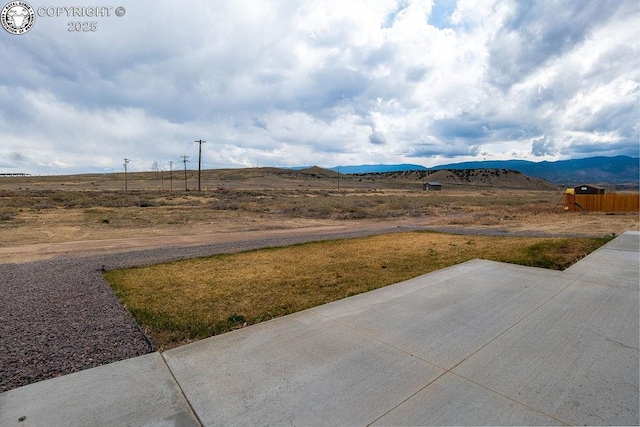 exterior space with a rural view