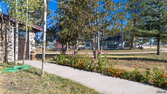 surrounding community with a lawn